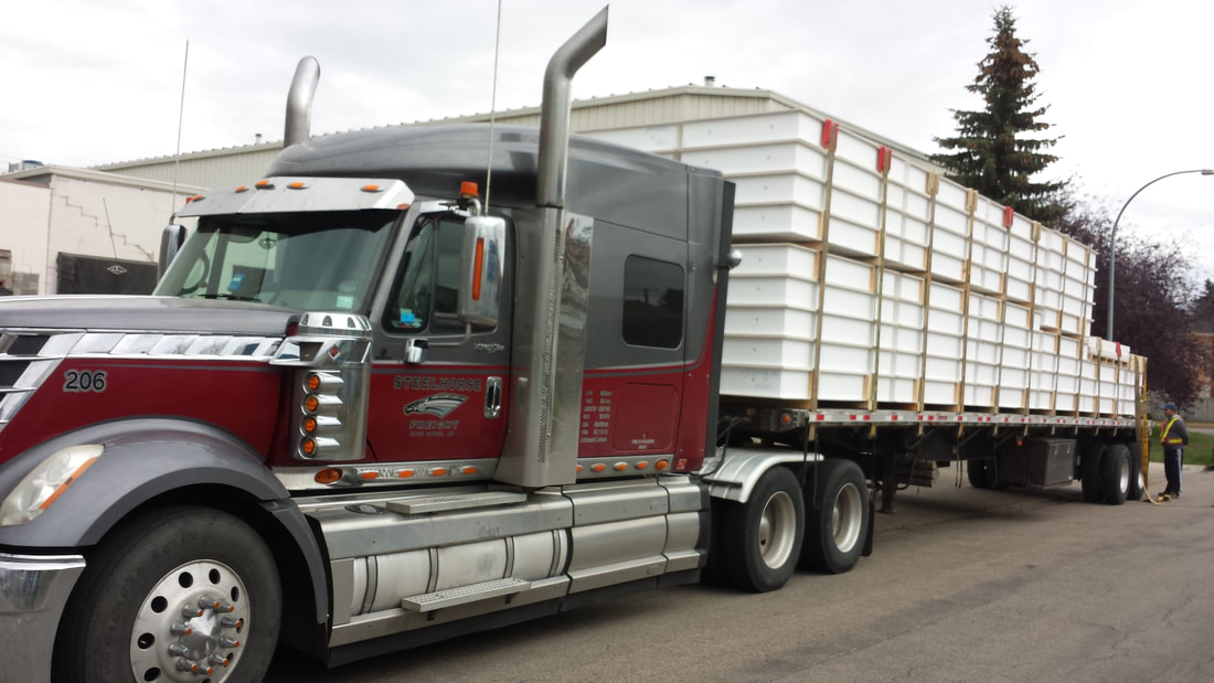semi-truck transporting insulating panels